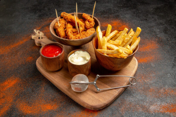 Chicken and chips with ketchup
